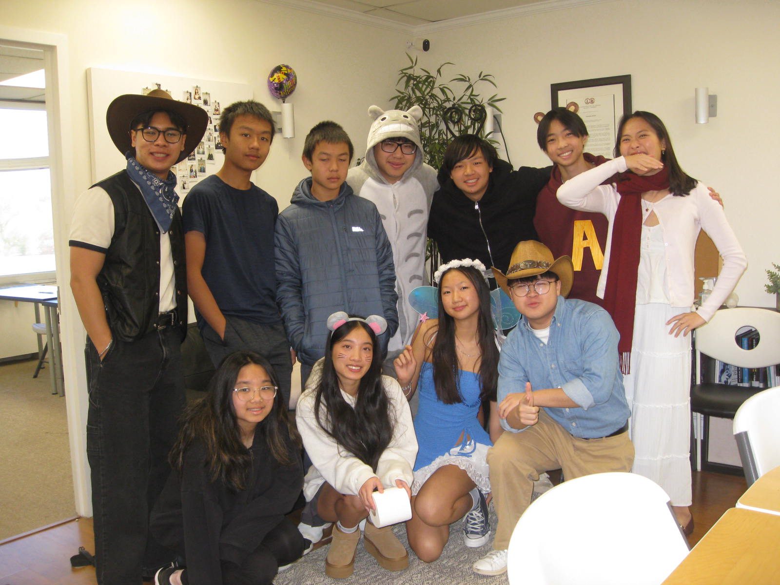 Students in costume at an AASuccess office celebration