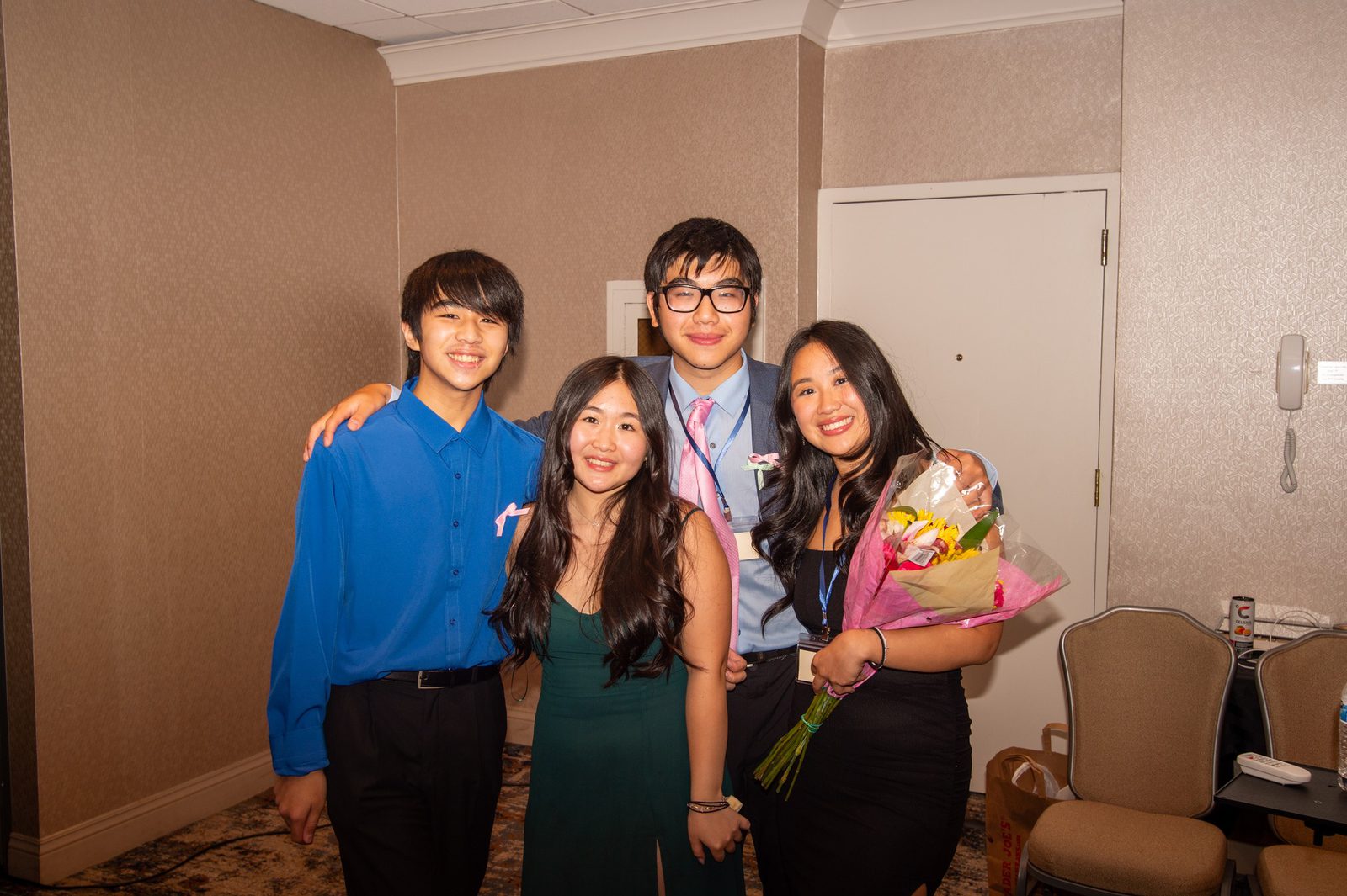 A student and family celebrating at the AASuccess Gala