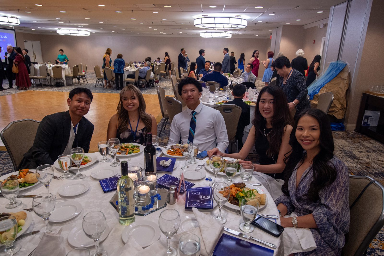 Students and supporters sharing a table at the AASuccess Gala