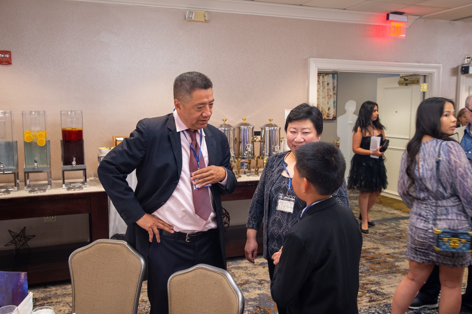A guest speaker talking with students at an AASuccess event