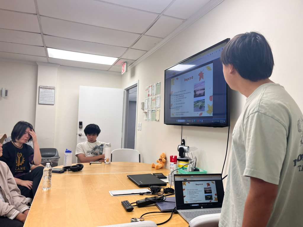 A student presenting in the AASuccess office
