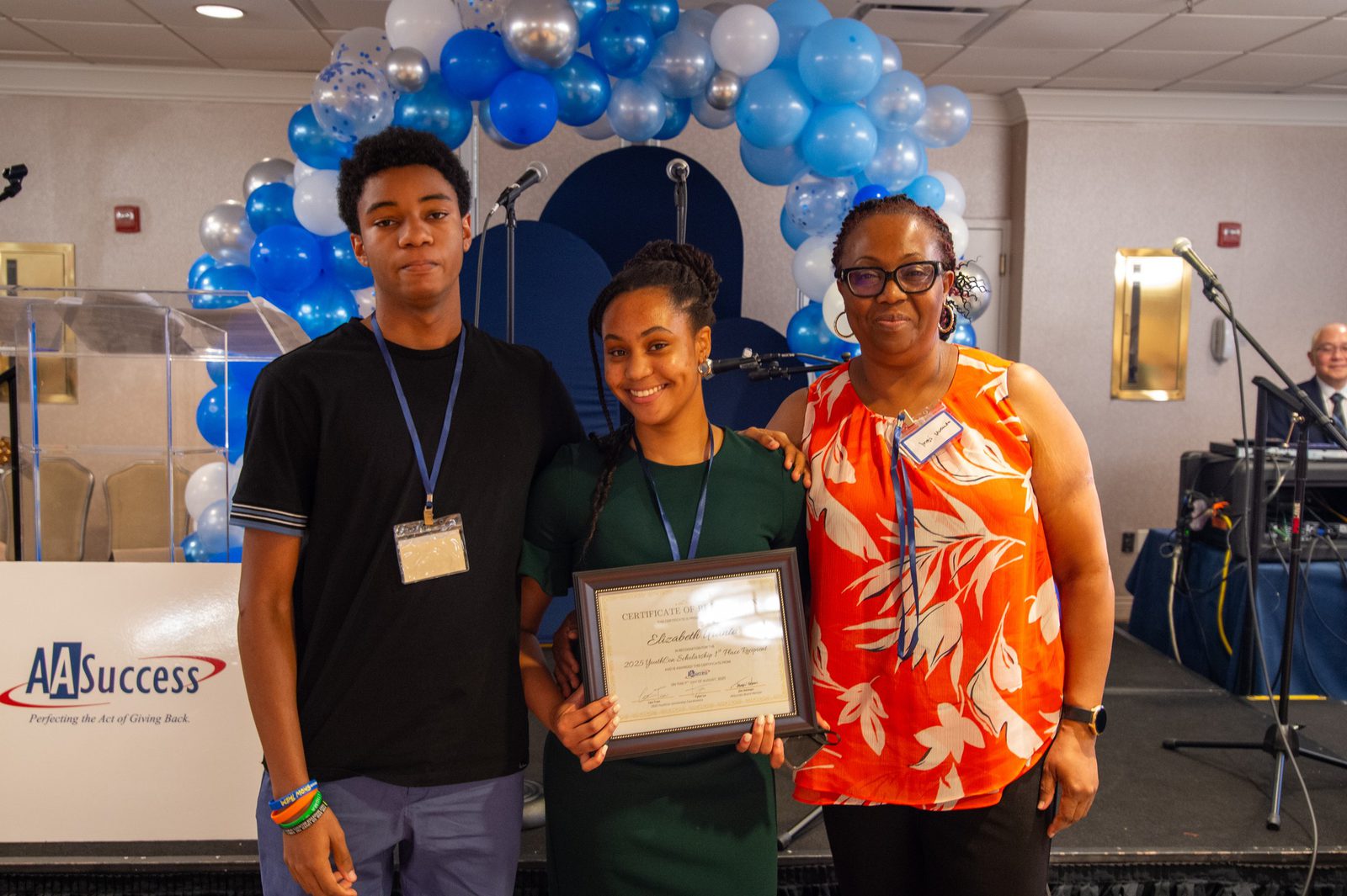 YouthCon 2025 scholarship winners with their certificates